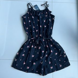 A floral romper kids size 13/14